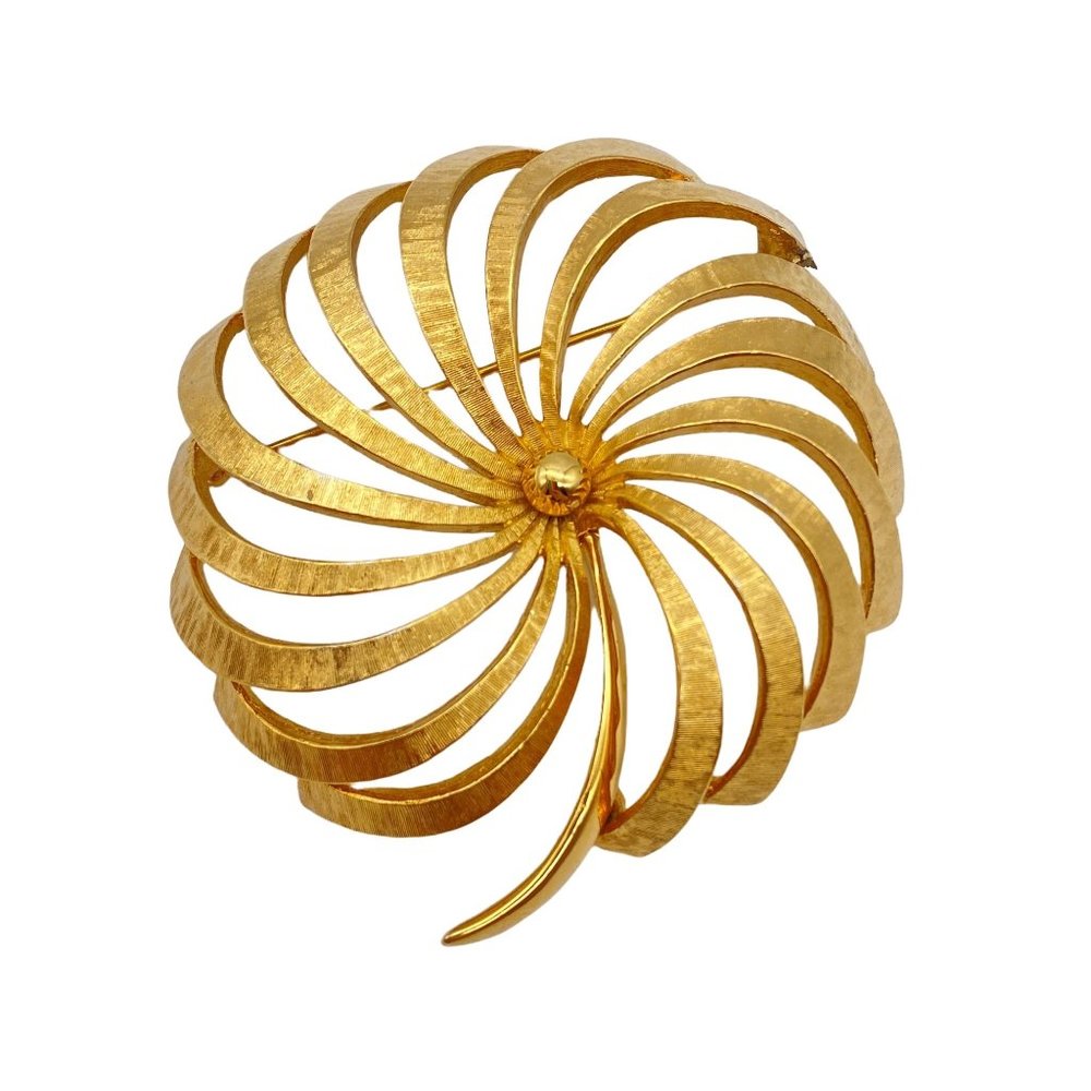 Vintage Monet gold tone pin wheel brooch lapel pin flower